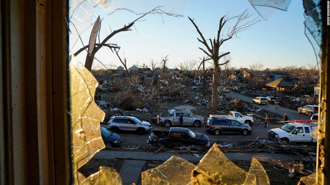 The devastation in Mayfield, Kentucky, is seen through a broken bedroom window on December 12.