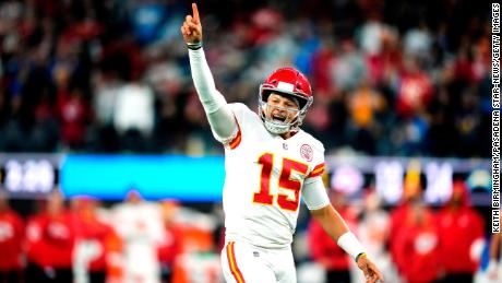 Patrick Mahomes celebrates as the Kansas City Chiefs defeat the Los Angeles Chargers 34-28 in overtime.