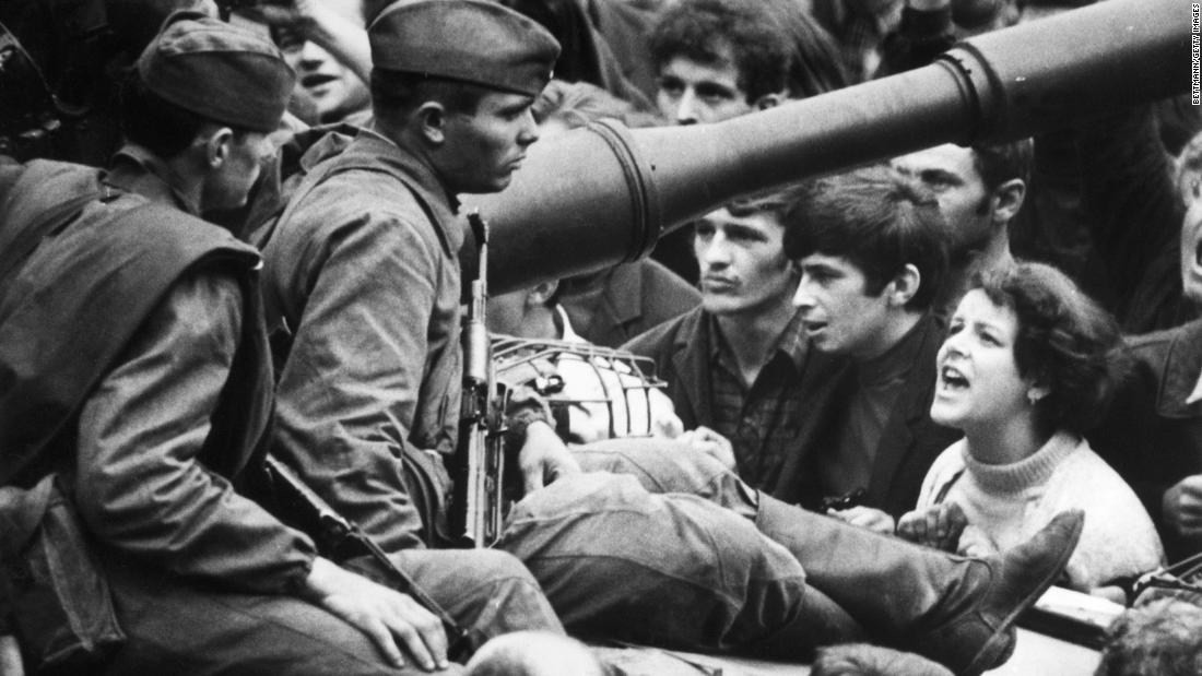 A young Czech woman shouts &quot;Ivan go home!&quot; to soldiers sitting on tanks in the streets of Prague in 1968. On January 5, 1968, reformer Alexander Dubcek became general secretary of the Communist Party in Czechoslovakia, pledging the &quot;widest possible democratizations&quot; as the Prague Spring movement swept across the country. Soviet and Warsaw Pact leaders sent an invasion force of 650,000 troops in August. Dubcek was arrested and hard-liners were restored to power.