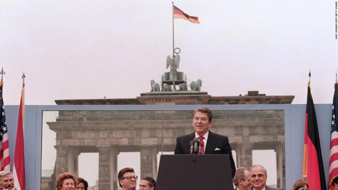 US President Reagan, commemorating the 750th anniversary of Berlin, addresses the people of West Berlin at the base of the Brandenburg Gate, near the Berlin Wall on June 12, 1987. Due to the amplification system being used, the President&#39;s words could also be heard on the Eastern (communist-controlled) side of the wall. &quot;Tear down this wall!&quot; was the famous appeal by Reagan, directed at Gorbachev, to destroy the Berlin Wall. The address Reagan delivered that day is considered by many to have affirmed the beginning of the end of the Cold War and the fall of the Soviet bloc. 