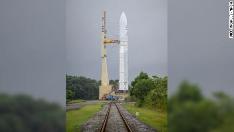 The Ariane 5 rocket and its cargo towers above the surroundings in French Guiana.