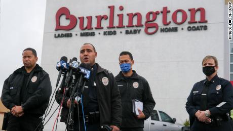 Los Angeles Police officials held a press conference at the scene where two people were killed by gunfire in a shooting at a Burlington store in North Hollywood, California, on Thursday.