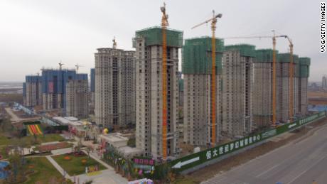 The world&#39;s most indebted property developer reports progress completing homes