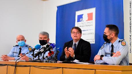 Public prosecutor François Perain (second right), flanked by other officials, speaks about the kidnapping of Mia in April 2021. 