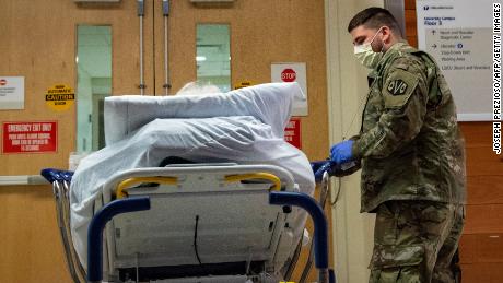 National Guard steps in to alleviate pressure on hospital overwhelmed by Omicron wave