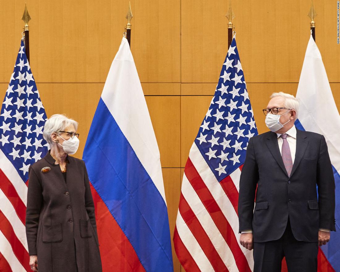 US Deputy Secretary of State Wendy Sherman (L) and Russian deputy Foreign Minister Sergei Ryabkov (R) pose for pictures as they attend security talks on soaring tensions over Ukraine at the US Permanent Mission in Geneva on January 10.