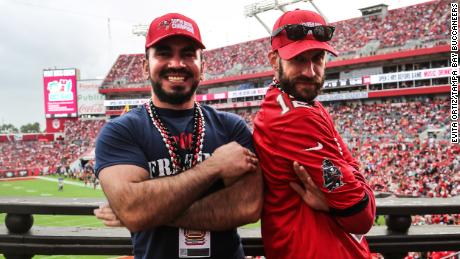 Said Noor, left, and Steve Morse cheer on the Buccaneers from the famed pirate ship inside the stadium on Sunday, January 16. 