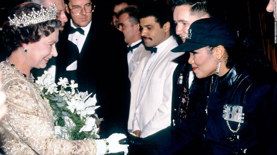 Queen Elizabeth II meets singer Janet Jackson in 1989 at the Royal Variety Performance at the London Palladium.