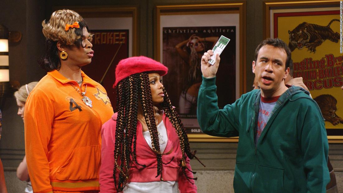 Finesse Mitchell, Janet Jackson and Fred Armisen as a ticket scalper in the &quot;Janet Ticket Line&quot; skit on &quot;土曜日の夜のライquotamp;quot; 四月に 10, 2004.