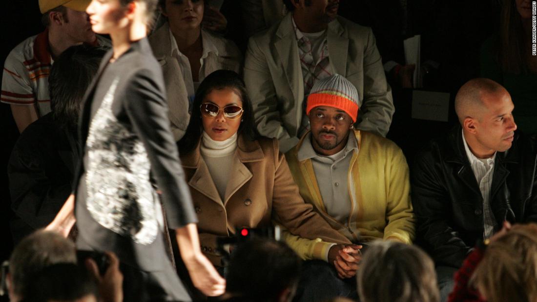 Janet Jackson and then-boyfriend Jermaine Dupri attend an Olympus Fashion Week event in New York City on February 8, 2005.