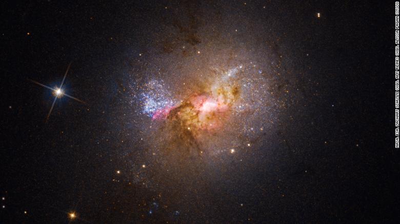 A black hole fueling star birth has scientists doing a double-take