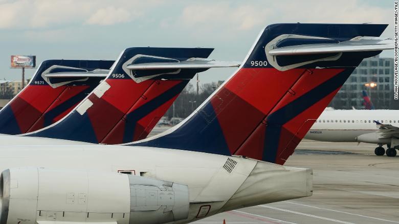 A man was arrested after allegedly exposing himself to a Delta flight attendant and passengers