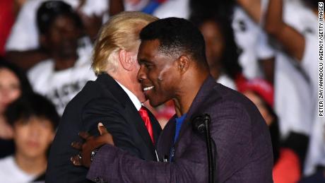 Republican Senate candidate Herschel Walker and former president Donald Trump hold a Save America rally in Perry, GA, United States on September 25, 2021.