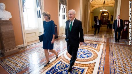 Sy. Lisa Murkowski and McConnell walk to McConnell&#39;s office in the Capitol after a vote in October 2018.