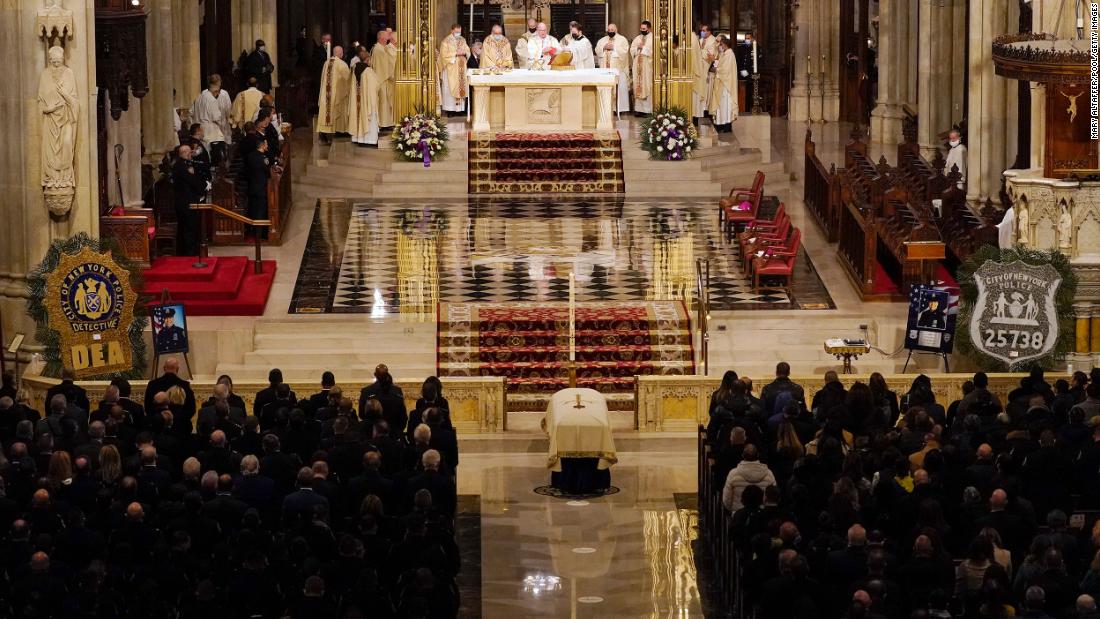 Cardinal Timothy Dolan presides over the funeral service for New York police officer Jason Rivera on Friday, enero 28. Rivera, 22, was killed last week while responding to a call.