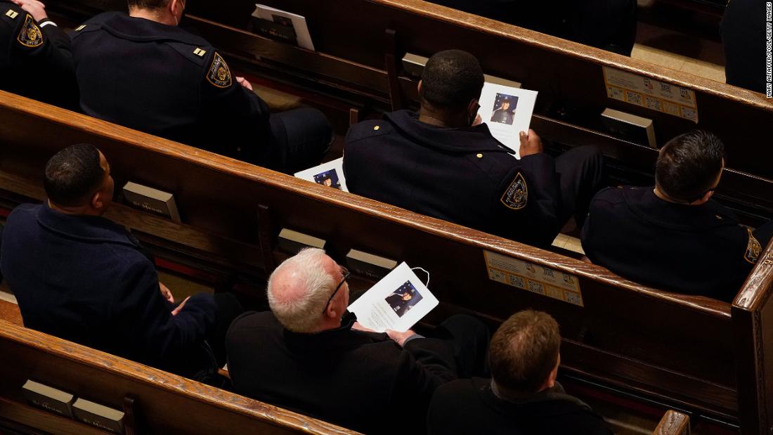 Police officers attend the funeral inside St. Patricio&#39;s Cathedral.