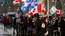 Protesters against Covid-19 vaccine mandates and restrictions are seen in front of Parliament on Saturday in Ottawa.