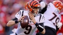 Burrow rolls out to pass against the Chiefs.