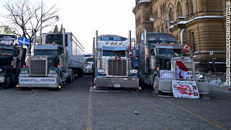 Trucks lined up next to the Parliament building during the 4th Day of Trucker's protest against the mandatory vaccine policy imposed on the Canadian truckers returning from USA to avoid a two week quarantine at Parliament Hill in Ottawa-Canada (Photo by Arindam Shivaani/NurPhoto via Getty Images)