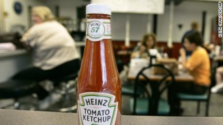 The orginal purpose of the label on the neck of the Heinz ketchup bottle was to draw more attention to the &quot;57 varieties&quot; slogan, according to the Heinz History Center.