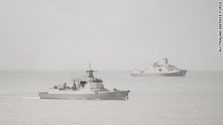 Two Chinese People&#39;s Liberation Army warships are seen in an image released by the Australian military after it said one of the ships endangered an Australian plane with a laser.