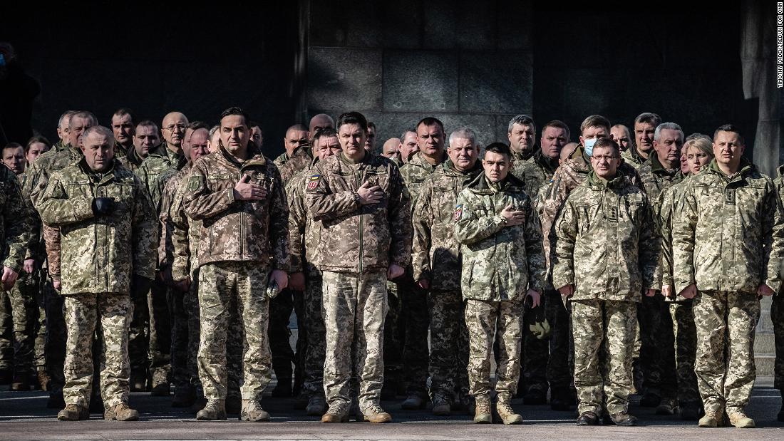 Ukrainian soldiers pay their respects during Sydorov&#39;s funeral in Kyiv on February 22.