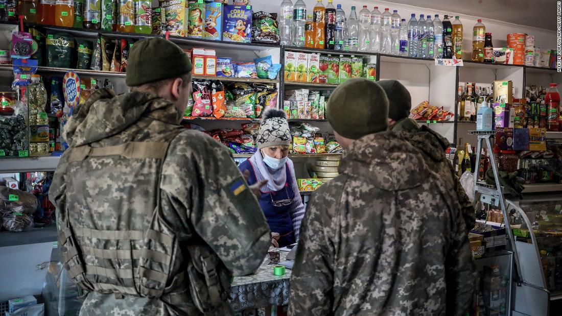 Ukrainian servicemen shop in the front-line town of Avdiivka, Ukraine, on February 21.