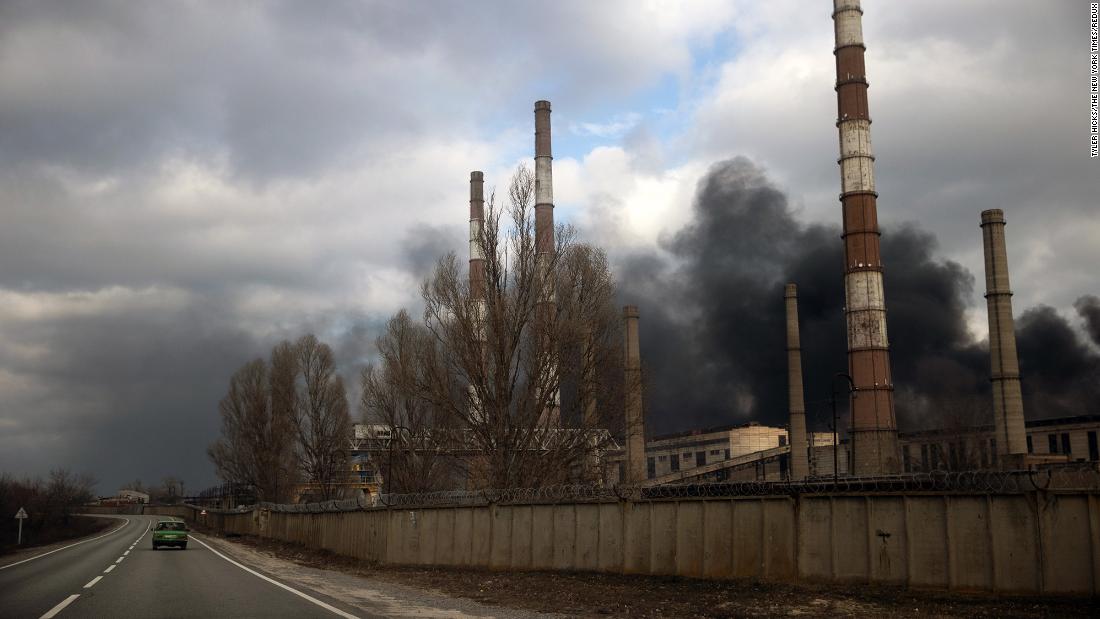 Smoke rises from a damaged power plant in Shchastya that Ukrainian authorities say was hit by shelling on February 22.