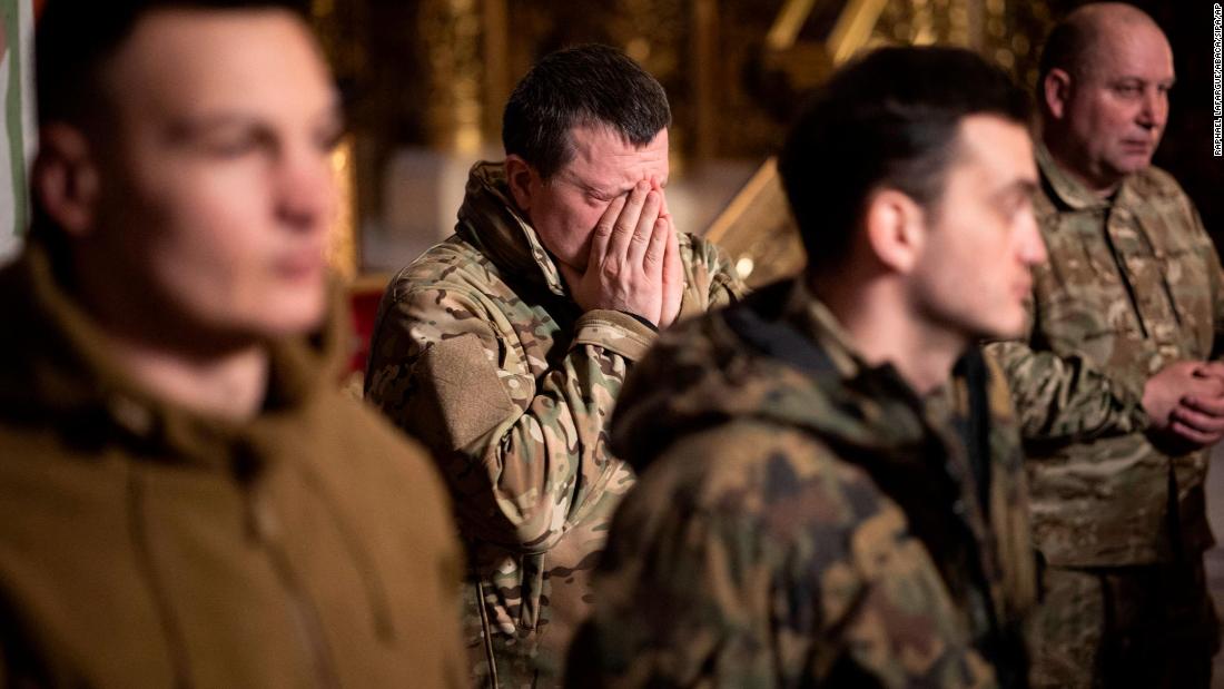 Ukrainian soldiers attend Mass at an Orthodox monastery in Kyiv on March 1.