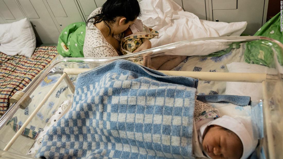 A mother cares for her two infant sons in the underground shelter of a maternity hospital in Kyiv on March 3. She gave birth a day earlier, and she and her husband haven&#39;t yet decided on names for the twins.