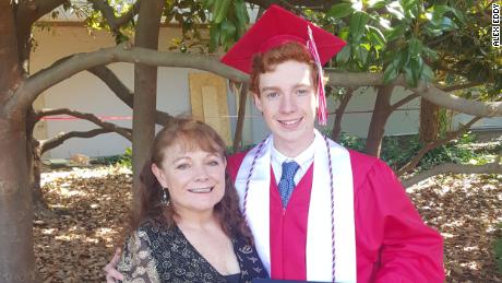 Tyler Gilreath and his mother, Tamra Demello, after his high school graduation in May 2019. He died in September at age 20.