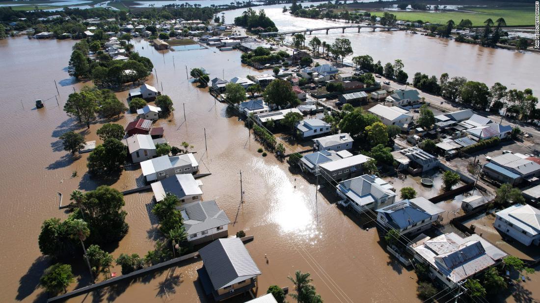 A photo taken with a drone shows houses inundated by floodwaters in Woodburn, on March 7.