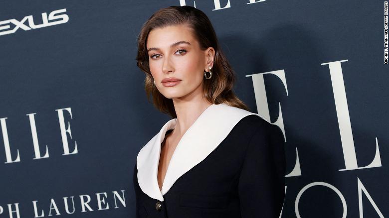 Hailey Bieber says she is home after being hospitalized for a blood clot in her brain