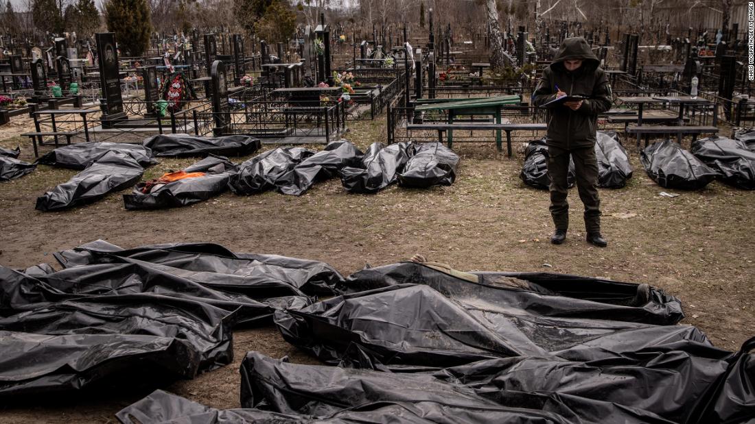 A man works to catalog some of the bodies of civilians who were killed in and around Bucha. &lt;a href =&quot;https://www.cnn.com/2022/04/03/europe/bucha-ukraine-civilian-deaths-intl/index.html&quot; target =&quot;_blank&quot;&gt;Shocking images&amltlt;/un&ampgtt; showing the bodies of civilians scattered across the suburb of Kyiv sparked international outrage and raised the urgency of ongoing investigations into alleged Russian war crimes. Ukrainian President Volodymyr Zelensky called on Russian leaders to be held accountable for the actions of the nation&#39;s military. The Russian Ministry of Defense, senza prove, claimed the extensive footage of Bucha was &quot;impostore.&amquotot;