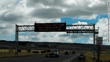 A road sign over I-25 on the outskirts of Laramie leading to Cheyenne, Wyoming, warns of high wind speeds on Friday, March 5, 2018.