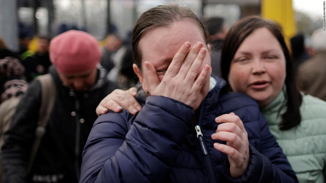 A woman who recently evacuated Mariupol cries after arriving at a registration center for internally displaced people in Zaporizhzhia on April 21. 
