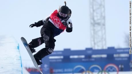 Chloe Kim performing a trick during the Women&#39;s Snowboard Halfpipe Final at the Beijing 2022 Winter Olympics.