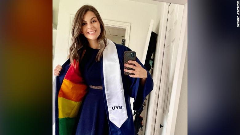 A BYU student flashed a Pride flag at graduation to honor LGBTQ students like herself