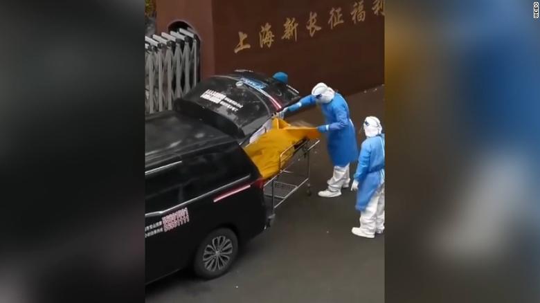 'What is going on in Shanghai': Horror as elderly man taken to morgue in body bag -- while still alive