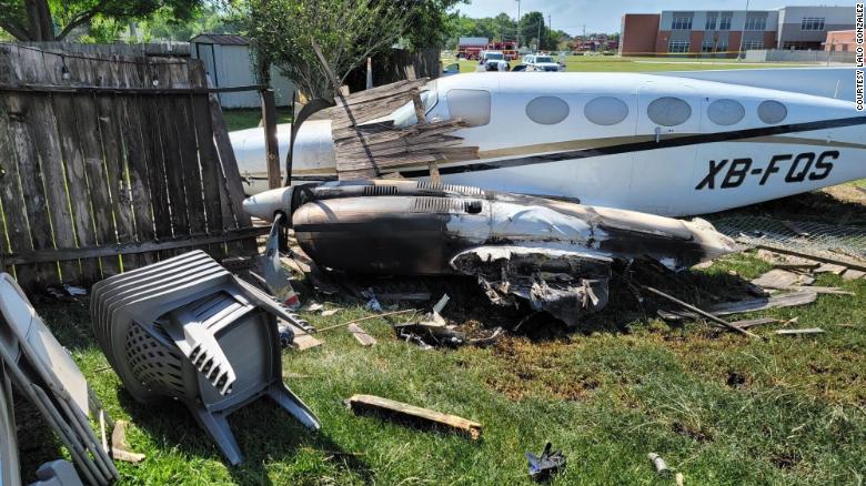 A small plane crashed into a backyard in Houston. All four people on board walked away