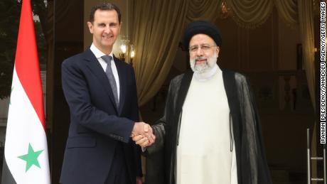 Iranian President Ebrahim Raisi (R) meets with Syrian President Bashar al Assad (L) in Tehran, May 8. Assad, who was making his second trip to the Iranian capital since the start of Syria&#39;s conflict in 2011, also held talks with Supreme Leader Ayatollah Ali Khamenei, during which both leaders called for stronger ties. 