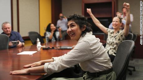 Cecilia Reyes, of the Chicago Tribune, reacts as she and Madison Hopkins of the Better Government Association, not pictured, win the Pulitzer Prize in Local Reporting at the Chicago Tribune&#39;s Freedom Center in Chicago, Monday, May 9, 2022.