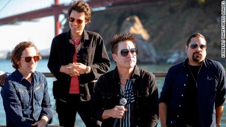 (From left) Jerry Becker, Taylor Locke, Pat Monahan, and Hector Maldonado, of multi-Grammy Award-winning band Train, perform onstage in San Francisco for &quot;A Capitol Fourth&quot; in 2021.