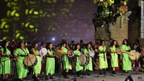 Egyptian women&#39;s band Tablet el-Set (Lady&#39;s Tambourine) perform at the 9th International Festival for Drums and Traditional Arts at North Cairo Wall Theater on the Cairo&#39;s historic Moez Street on May 22.