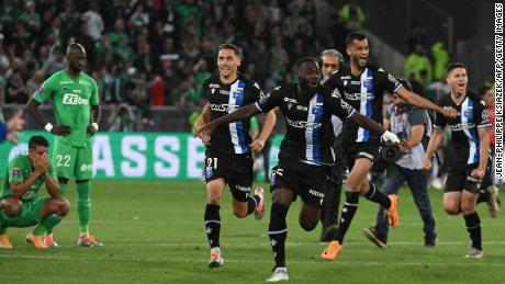 Auxerre&#39;s players celebrate their victory against St Étienne.