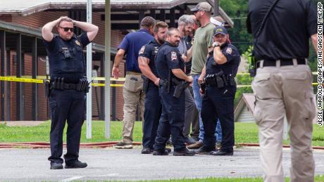 Police shoot and kill a man allegedly trying to enter a patrol vehicle near an Alabama school 