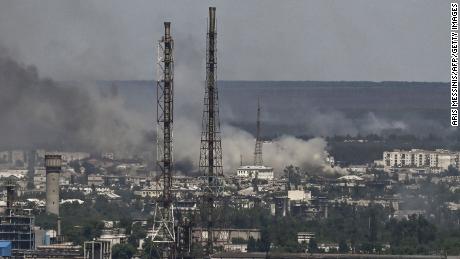 Black smoke and dirt rise from the nearby city of Severodonetsk during battle between Russian and Ukrainian troops in the eastern Ukraine region of Donbas on June 9, 2022. 