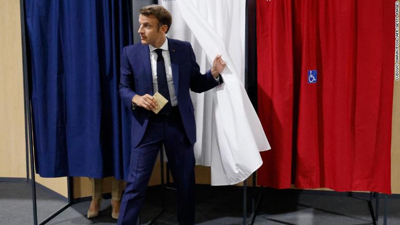 Macron's centrists edge ahead of left in French first round vote