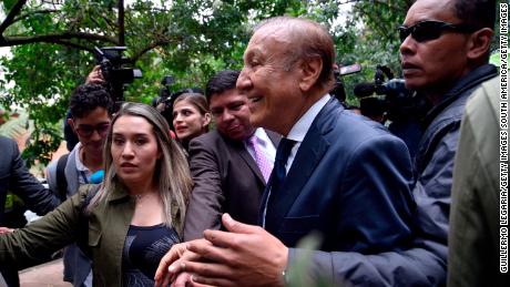 Hernandez is escorted by a security detail ahead of the runoff vote in Bogota, コロンビア, in early June. 