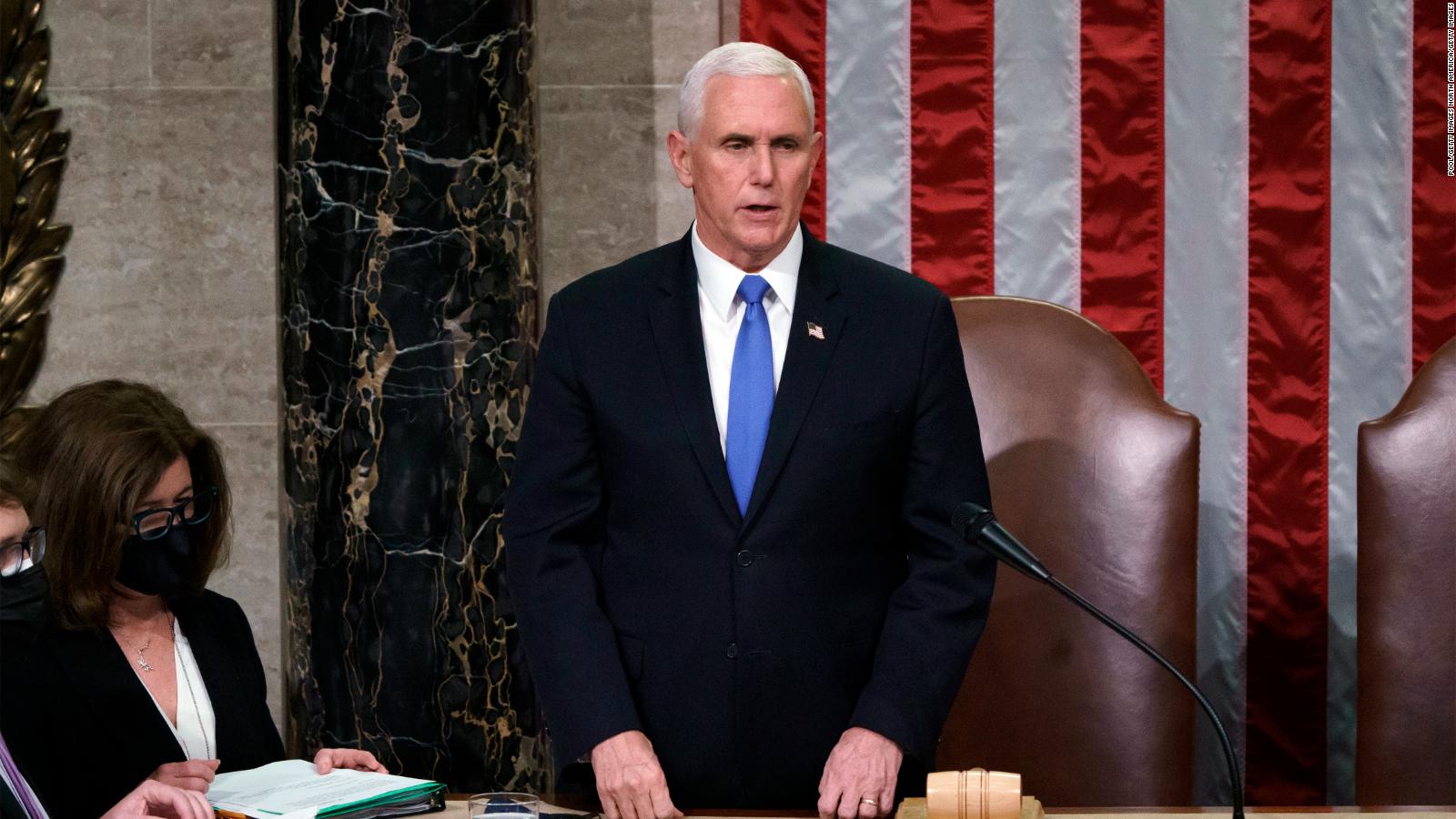 WASHINGTON, DC - JANUARY 07: Vice President Mike Pence reads the final certification of Electoral College votes cast in November's presidential election during a joint session of Congress, after working through the night, at the Capitol on January 7, 2021 in Washington, DC. Congress reconvened to ratify President-elect Joe Biden's 306-232 Electoral College win over President Donald Trump, hours after a pro-Trump mob broke into the U.S. Capitol and disrupted proceedings. (Photo by J. Scott Applewhite - Pool/Getty Images)